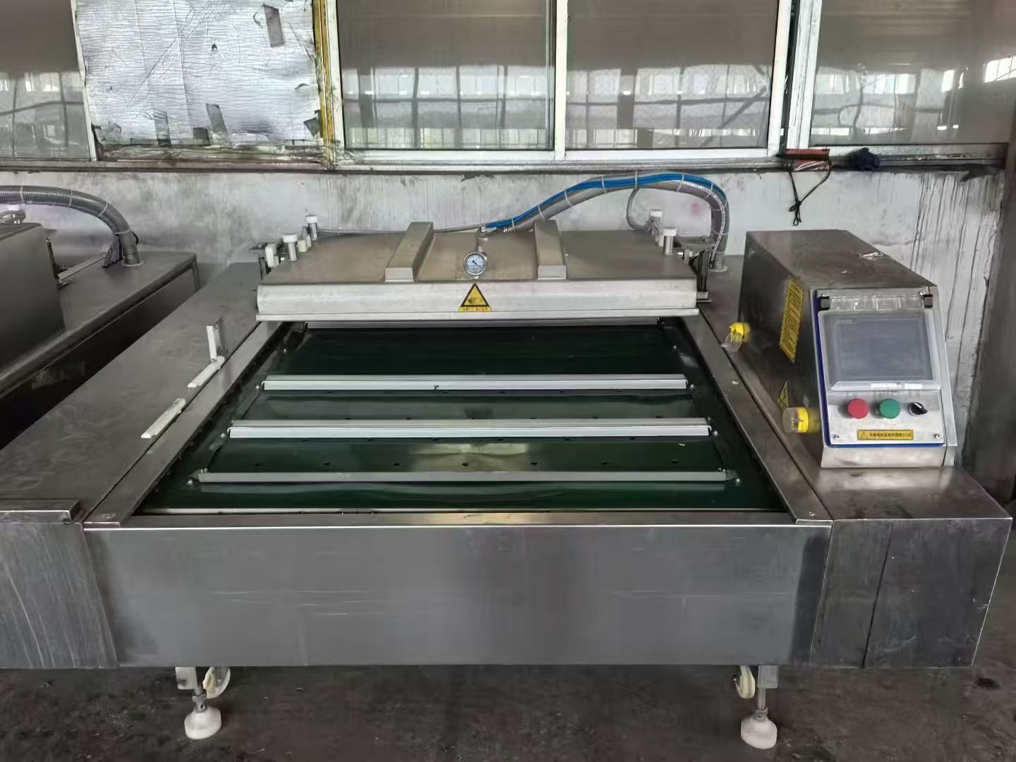 Used Continuous Vacuum Packaging Machine &mdash; Model 1100